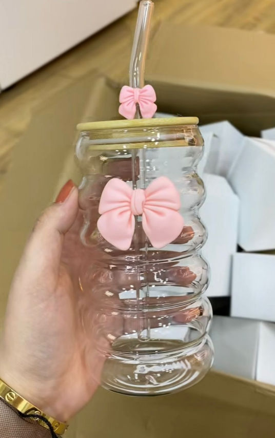 Transparent glass cups with straw
