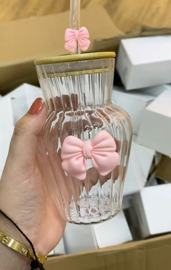 Transparent glass cups with straw