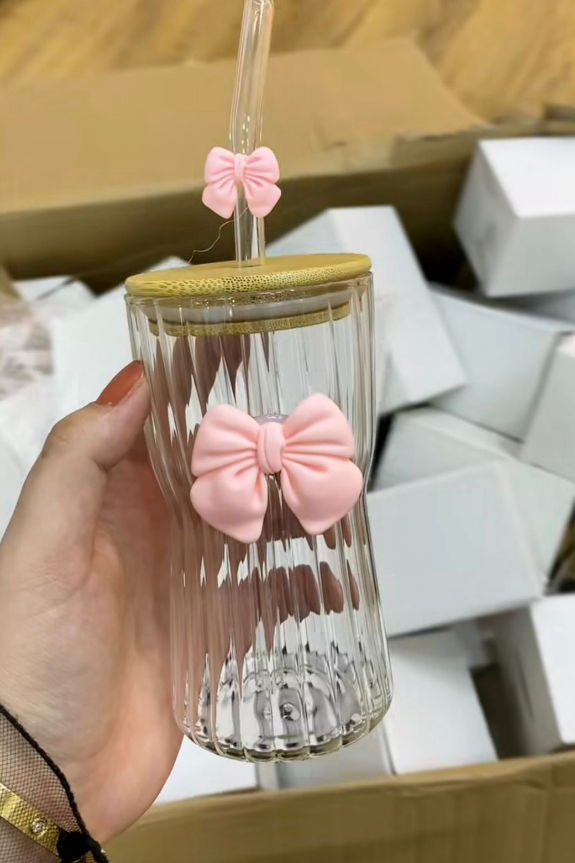 Transparent glass cups with straw