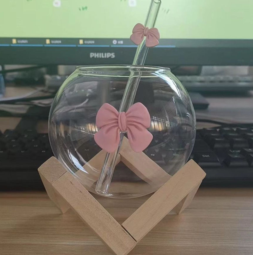 Transparent glass cups with straw